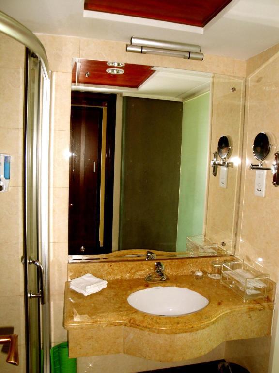 Overseas Chinese International Hotel Csingtao Szoba fotó