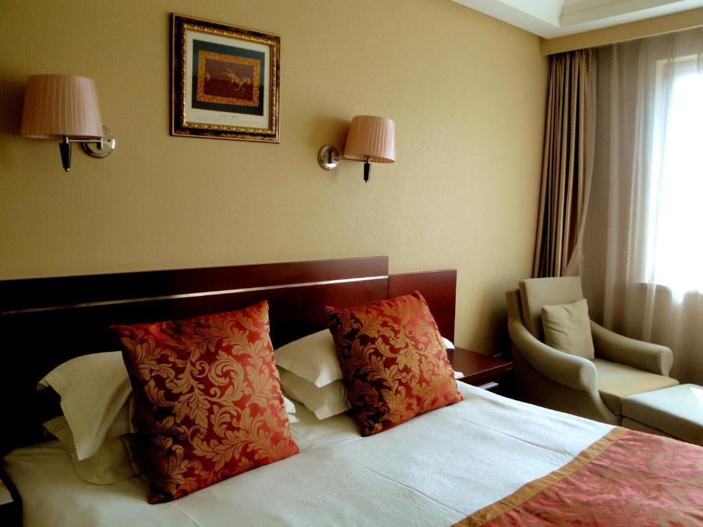 Overseas Chinese International Hotel Csingtao Szoba fotó
